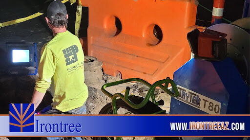 technician checking video inspection camera for pipe lining Phoenix, AZ